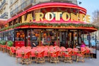 the red chairs and red marquee of La Rotonde.jpg